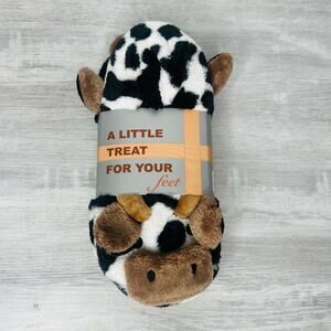 A little treat for your feet. Cow cozy fuzzy slippers size 4-6